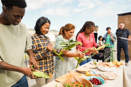 Preview: Multigenerational people doing barbecue at home's rooftop