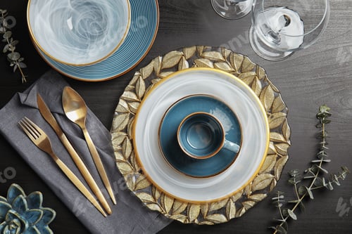 Preview: Elegant table setting on dark background, top view