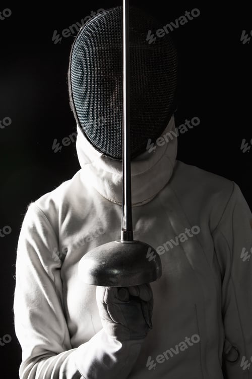 Preview: The portrait of woman wearing white fencing costume on black