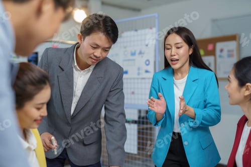 Preview: Asian businesspeople discussing and brainstorming in meeting room