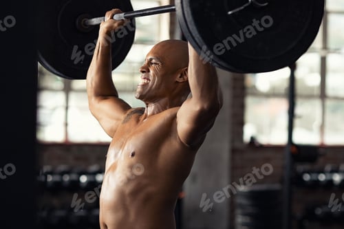 Preview: Strong black man doing weight lifting