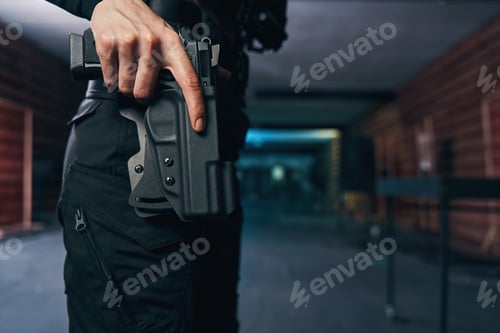 Preview: Female getting ready to shoot her handgun