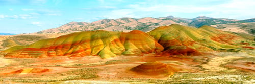 Preview: Aerial view of colorful hills and mountains in a scenic landscape