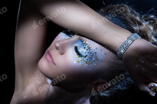 Preview: Attractive woman with artistic make-up