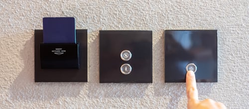 Preview: modern light switch on wall at home