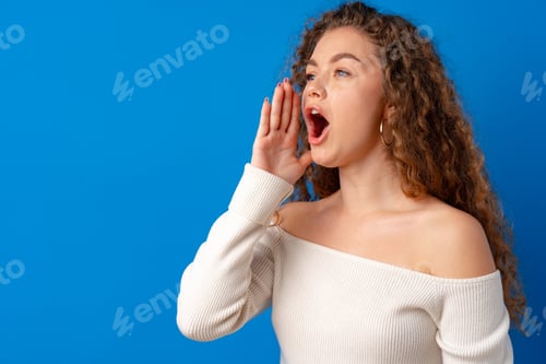 Preview: Portrait of a young woman shouting close up