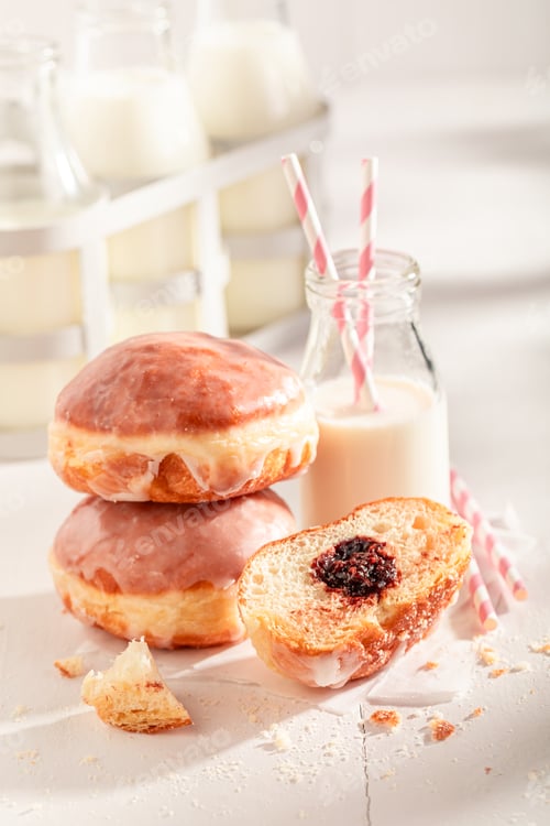 Preview: Sweet doughnuts served with milk in bottle.