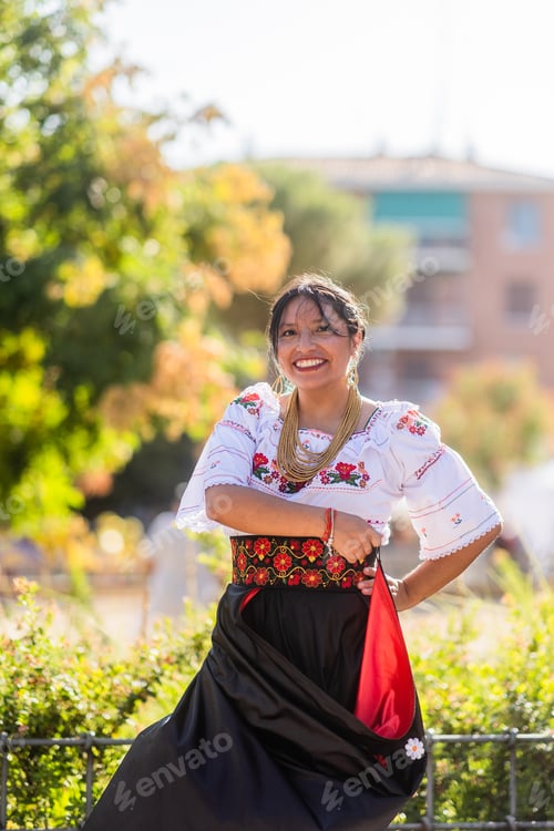 Preview: Hispanic woman dancing with traditional dress during columbus day parade. Dia de la hispanidad