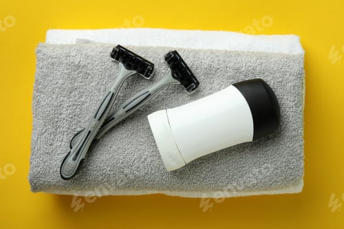 Preview: Concept of men's hygiene tools on yellow background