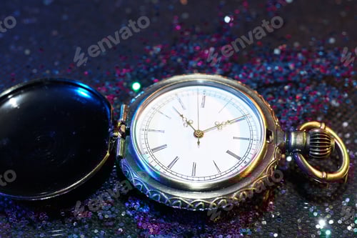 Preview: Vintage Pocket Watch on Colorful Sparkling Surface