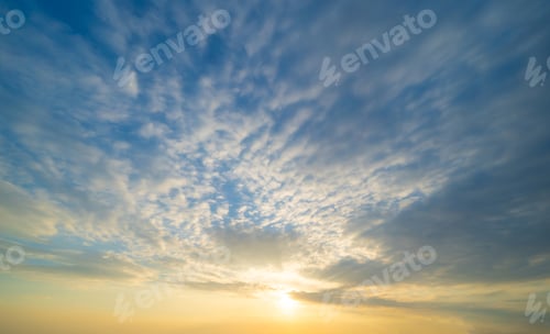Preview: Sunset sky. Abstract nature background. Dramatic blue and orange, colorful clouds at twilight time.