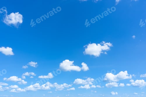 Preview: Clear blue sky background with small white clouds.