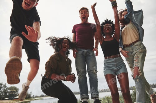 Preview: Into the air. Group of people have picnic on the beach. Friends have fun at weekend time