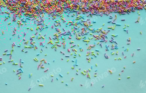 Preview: Colorful Sprinkles on Light Blue Background Top View