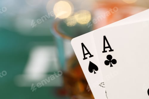 Preview: Playing cards on poker table background close up