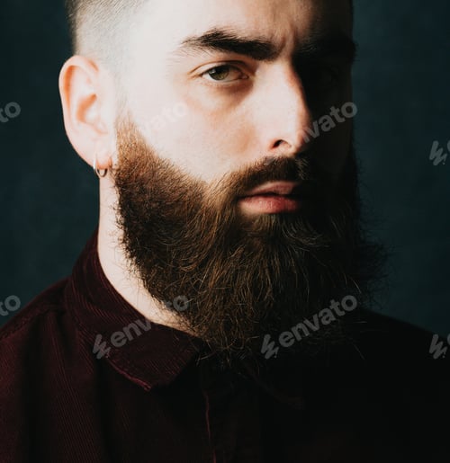 Preview: Portrait of a handsome bearded man, hipster style, serious, colorful, beauty