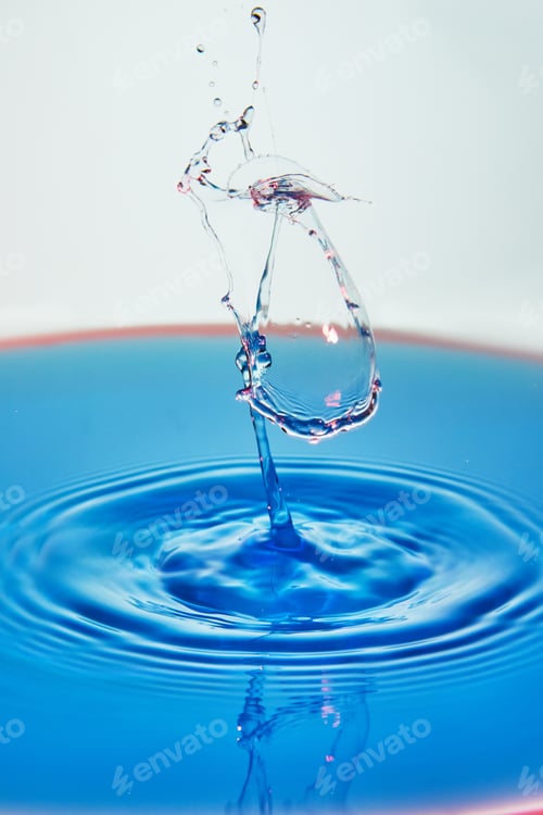 Preview: Abstract background of splash of color water, collision of colored drops, the concept
