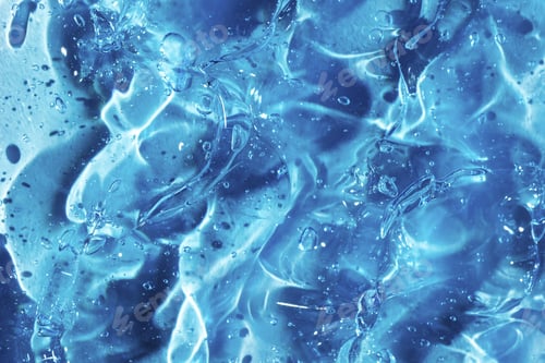 Preview: Close-up shot of blue liquid cosmetic gel or serum makeup swatches with a glossy,