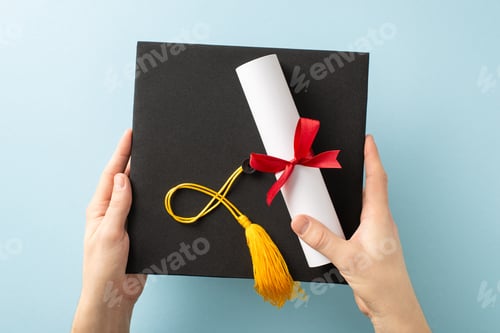 Preview: Hands holding a black graduation cap with golden tassel and a diploma with red ribbon