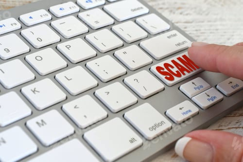 Preview: Online Email Scam concept computer keyboard with SCAM button about to be clicked on, no logos