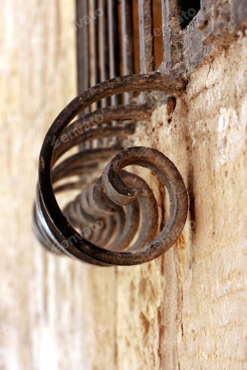 Preview: Abstract Wrought Iron Design on Distressed Wall