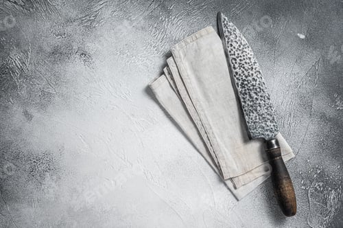 Preview: Hatchets for meat, Vintage butcher meat cleaver with cloth towel on wooden board. White background.