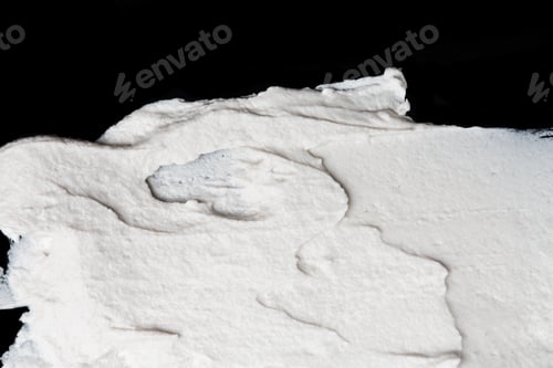 Preview: Structural Plaster White On A Black Background. White Cream. Paint Smear. Plasticine