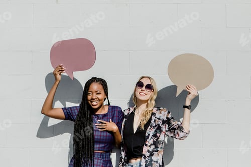Preview: Women holding speech bubbles