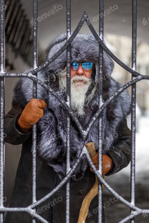 Preview: A elderly man with a magnificent mustache and beard.a stylish hipster man wearing a fur hat and coat