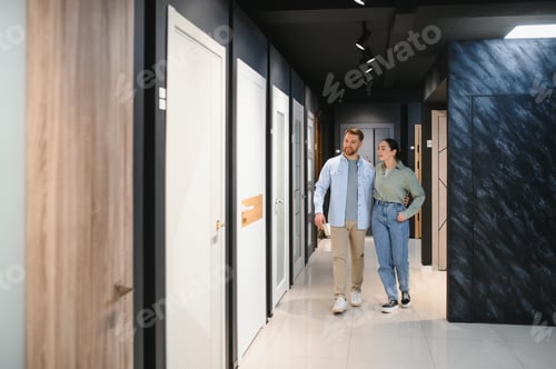 Preview: Couple choosing interior doors in a furniture store