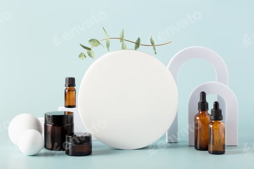 Preview: Various blank cosmetic container mock-ups on podiums and geometrical forms