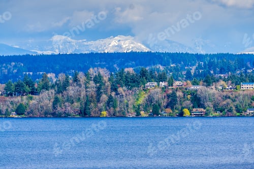 Preview: A View Of Homes In Bellevue, Washington With The Cascades In The Distance.