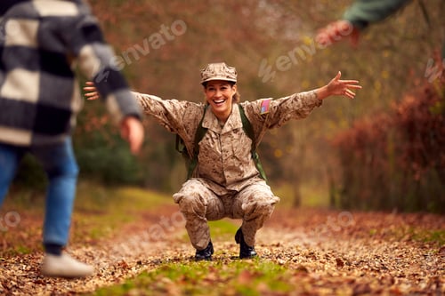 Preview: American Female Soldier In Uniform Returning Home On Leave To Family Greeted By Two Children