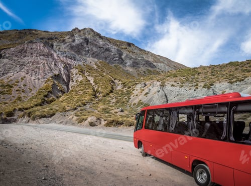 Preview: Red bus on a road at Cajon del Maipo Canyon - Chile