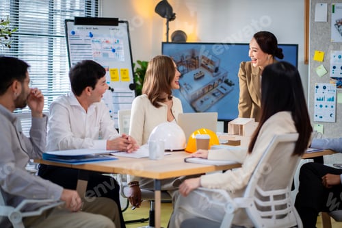 Preview: Group of young male and female business people in the office