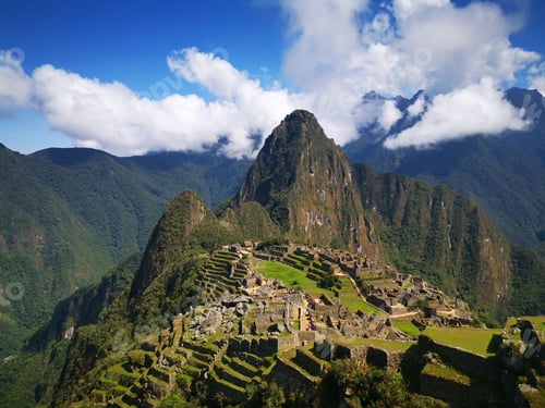 Preview: Ancient Incan site of Machu Picchu in Peru, surrounded by lush, mountainous terrain