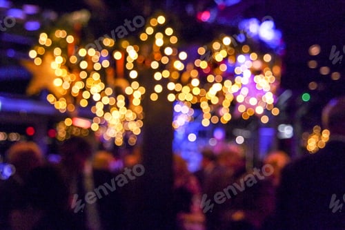 Preview: Bokeh Christmas tree decorations and lights.