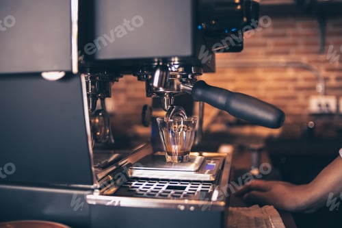 Preview: Barista cafe making coffee with coffee machine. Coffee preparation service concept.