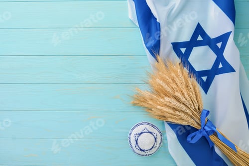 Preview: Shavuot jewish background. Ripe bouquet of wheat with blue ribbon with Israel flag and backgrounds.