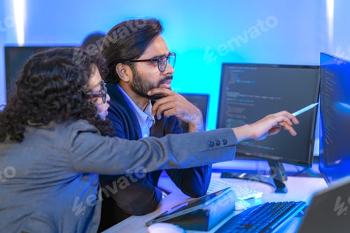 Preview: Diverse team of AI developers collaborating in a modern office.