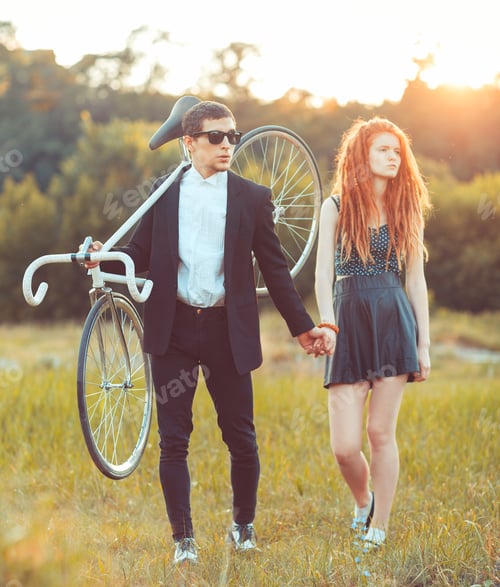 Preview: Guy with the girl and bicycle outdoors