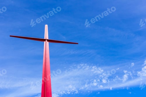 Preview: Red cross against blue sky background