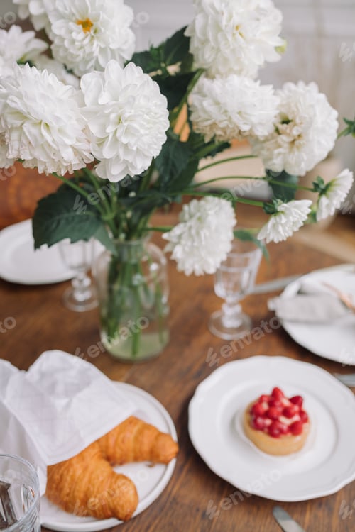 Preview: Table setting for family meal at home.
