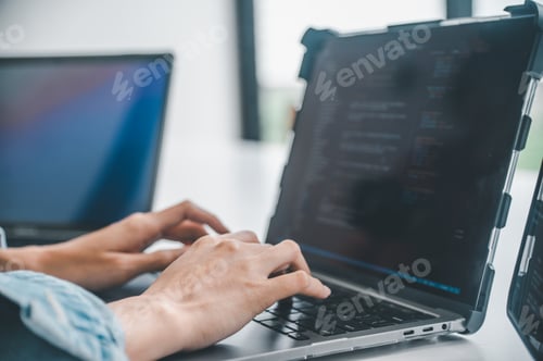Preview: Female programmer working on coding, software development and web design.