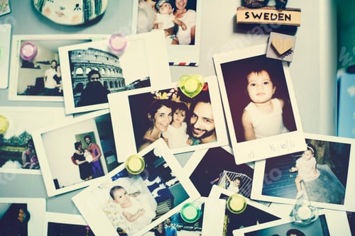 Preview: A bunch of family photos on the fridge door