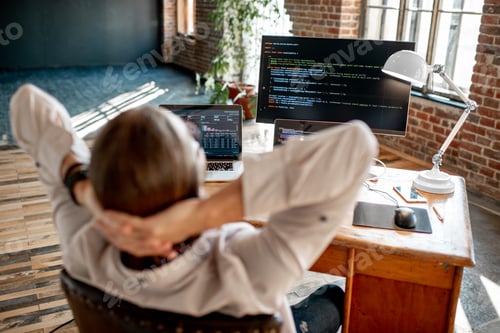 Preview: Programmer working with program code