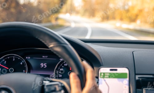 Preview: Steering wheel in a car close up, high speed driving on the road.