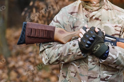 Preview: Hunting equipment. Brutal masculine hobby. Man observing nature background.