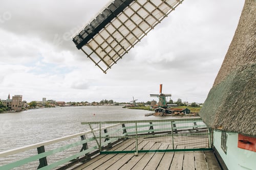 Preview: Rural landscape with windmill in Zaanse Schans. Holland, Netherlands. Authentic Zaandam mill.
