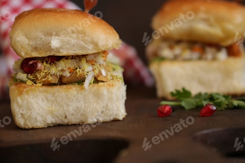 Preview: Selective focus shot of appetizing burgers on wooden board